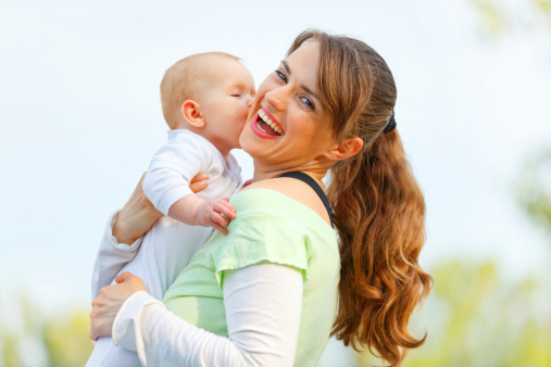 mom-laughing-breastfeeding-best